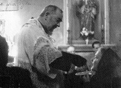 Mary Pyle receiving communion from Padre Pio